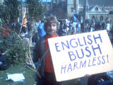 A man making a statement - in case you can't see he's holding up a branch from a normal hedge